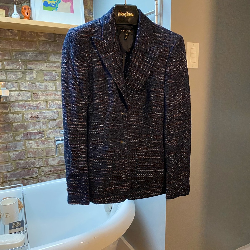 Escada, deep blue with multi colored threads; 2 pockets; button closure.